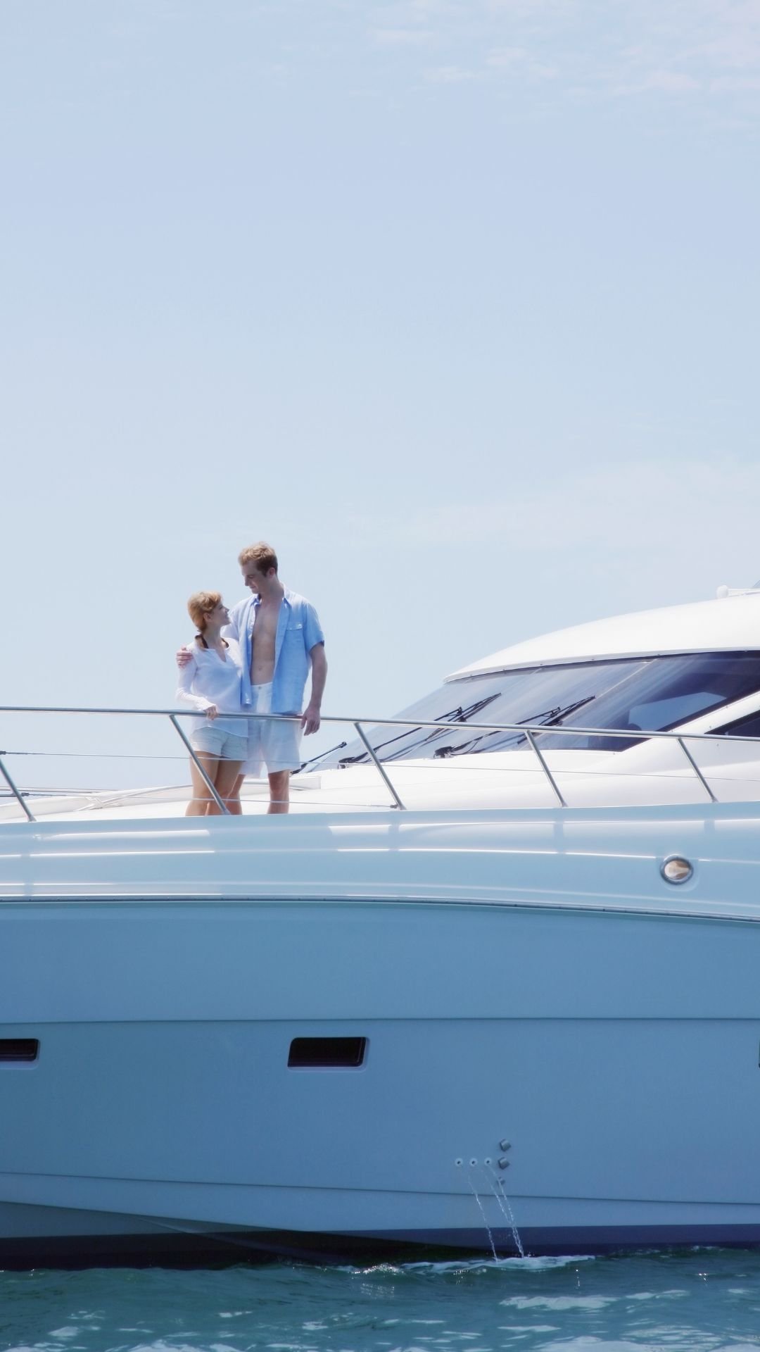 Couple enjoying romantic yacht charter
