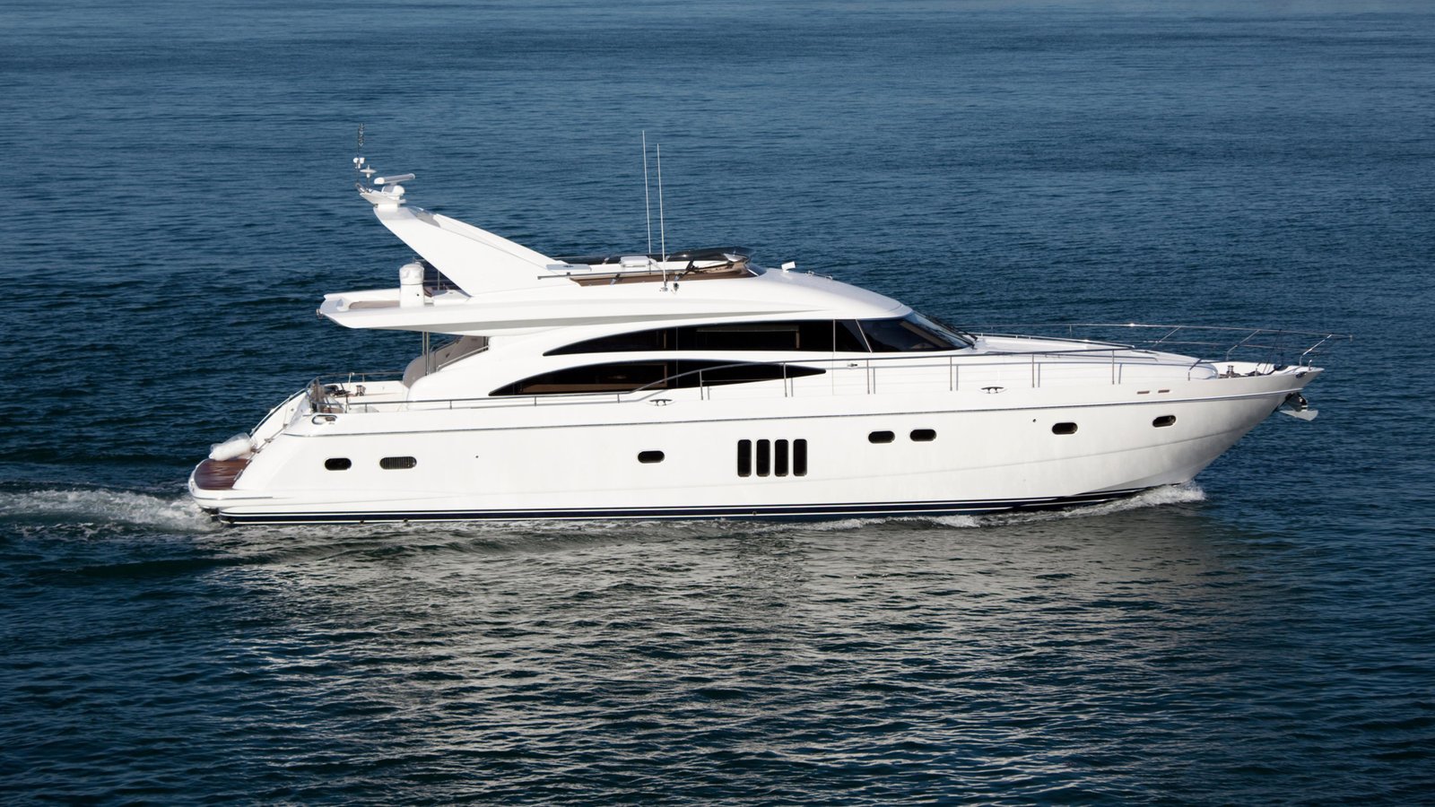 Classic motor yacht underway on open water